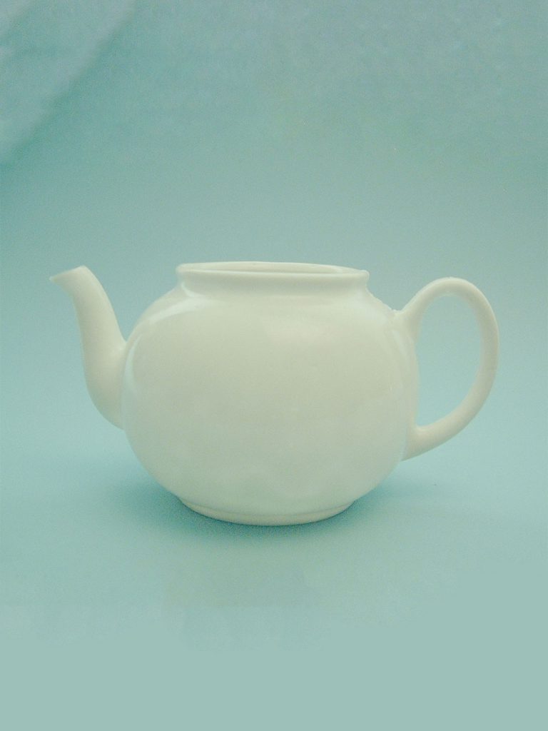 Sugar glass teapot. Dimensions teapot approx. 12 cm. x 16 cm.